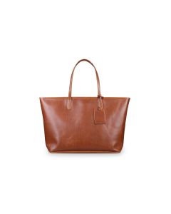 Front view of the St. Anne leather mom bag. This bag features British tan Florentine leather and tan stitching. It is sitting upright.