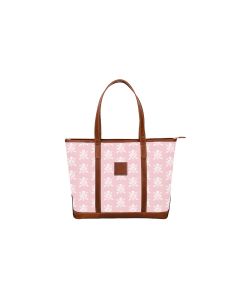 Front view of the Trolly Sleeve Tote With Pockets showing it closed and with monogrammed initials.