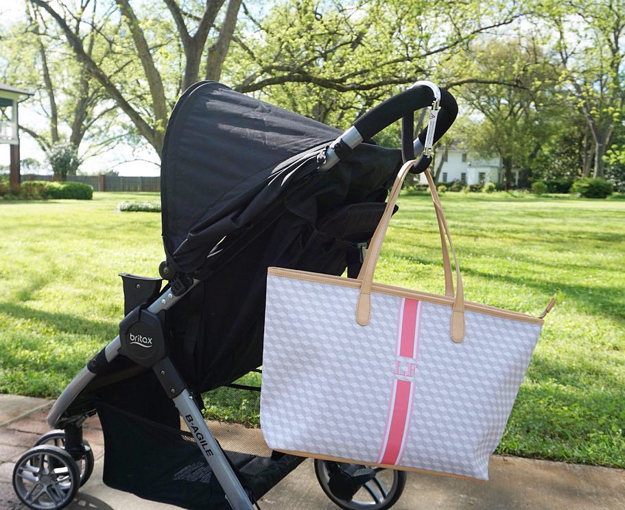 Convenient monogram diaper bag on stroller, combining functionality with elegance
