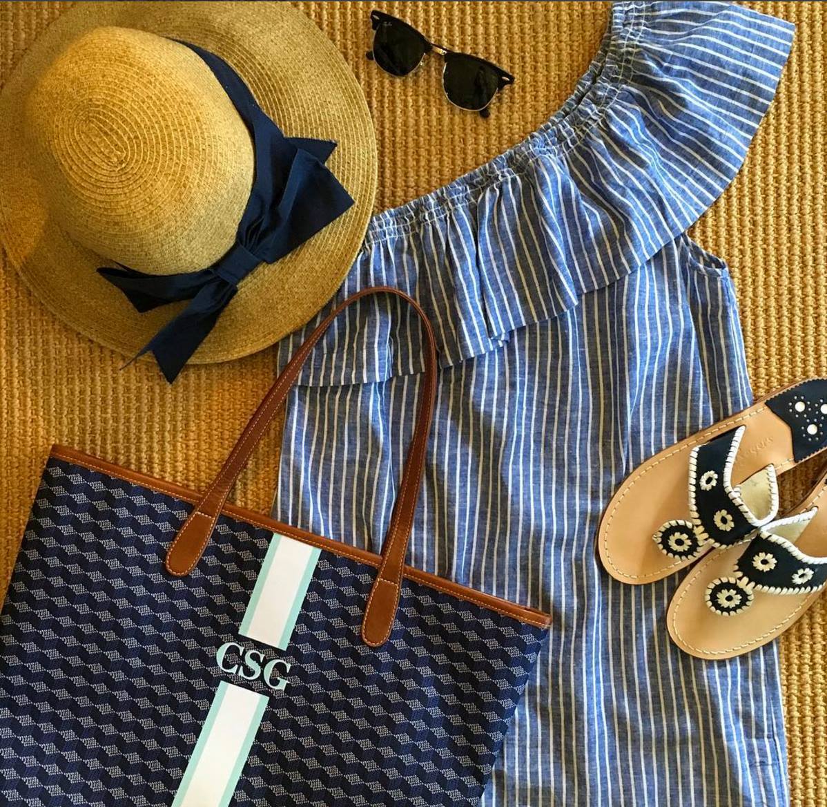 Beach-ready outfit complemented by a monogram purse