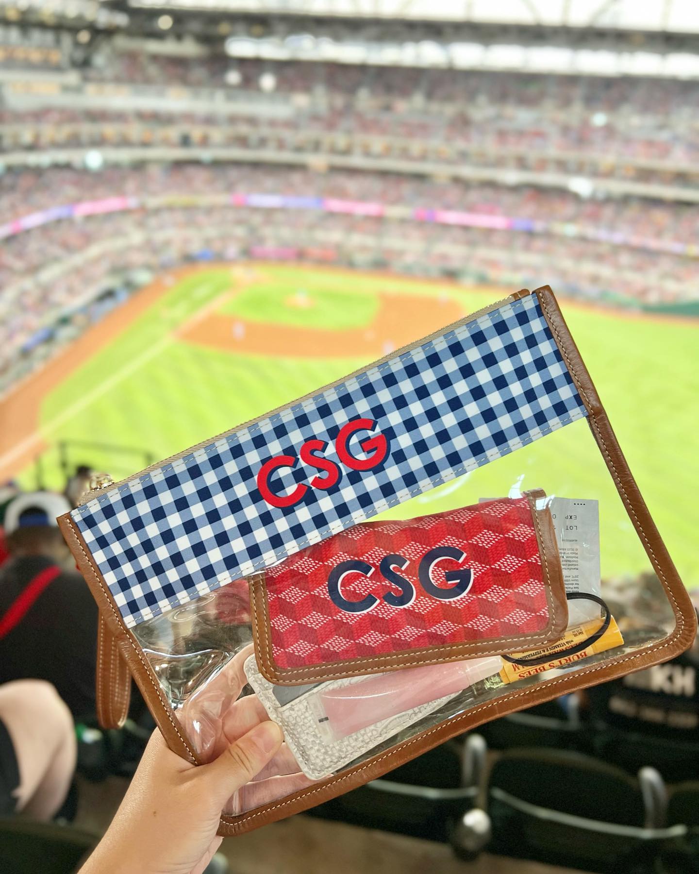 Monogrammed Clear Pouch at a sports event, perfect for stadium regulations and stylish enough for any fan.