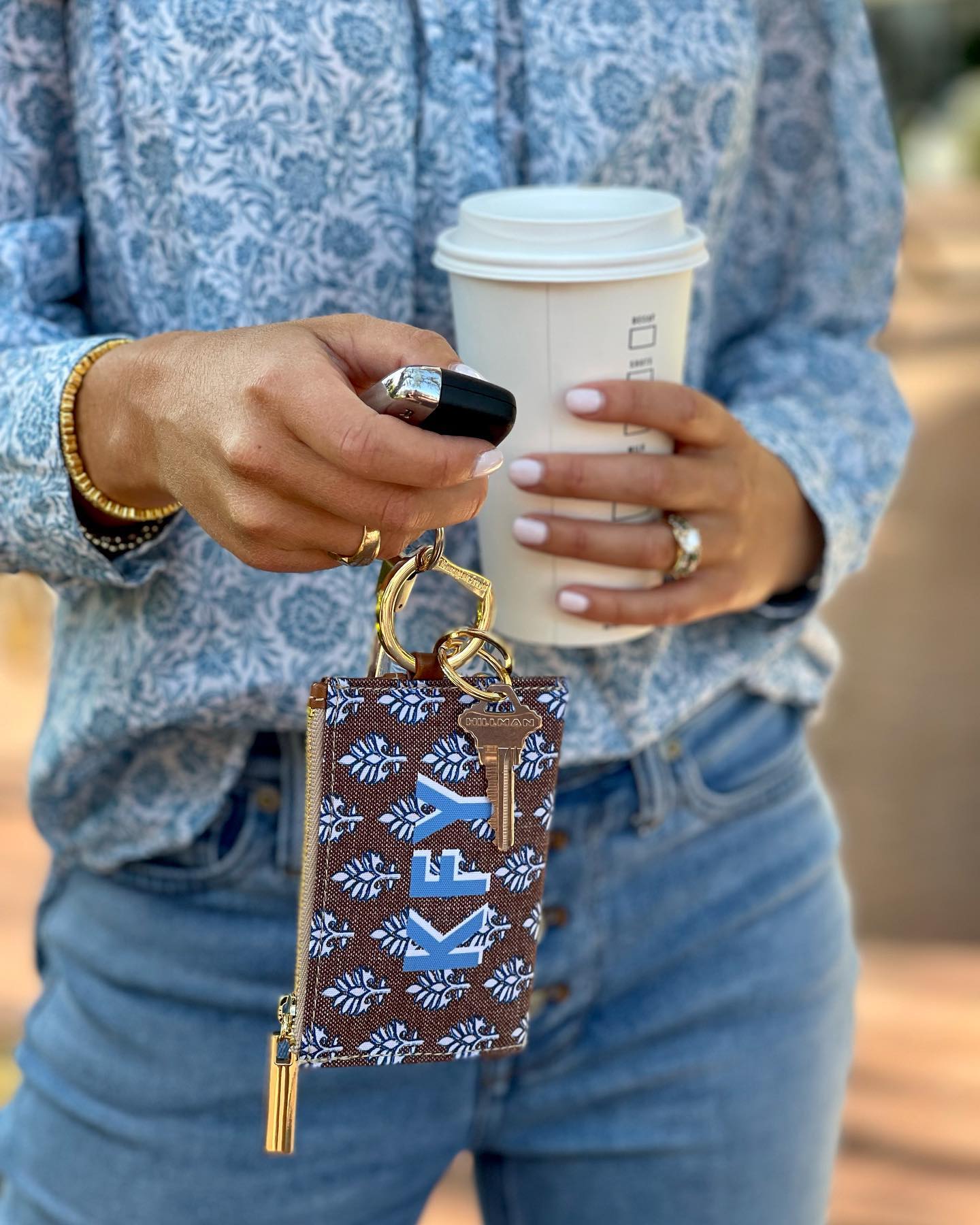 Blue floral pattern zip wallet keychain with coffee cup